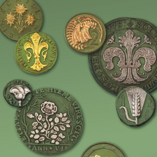 Münzen mit hervorgehobenen Blumenmotiven. Grafik: UMJ